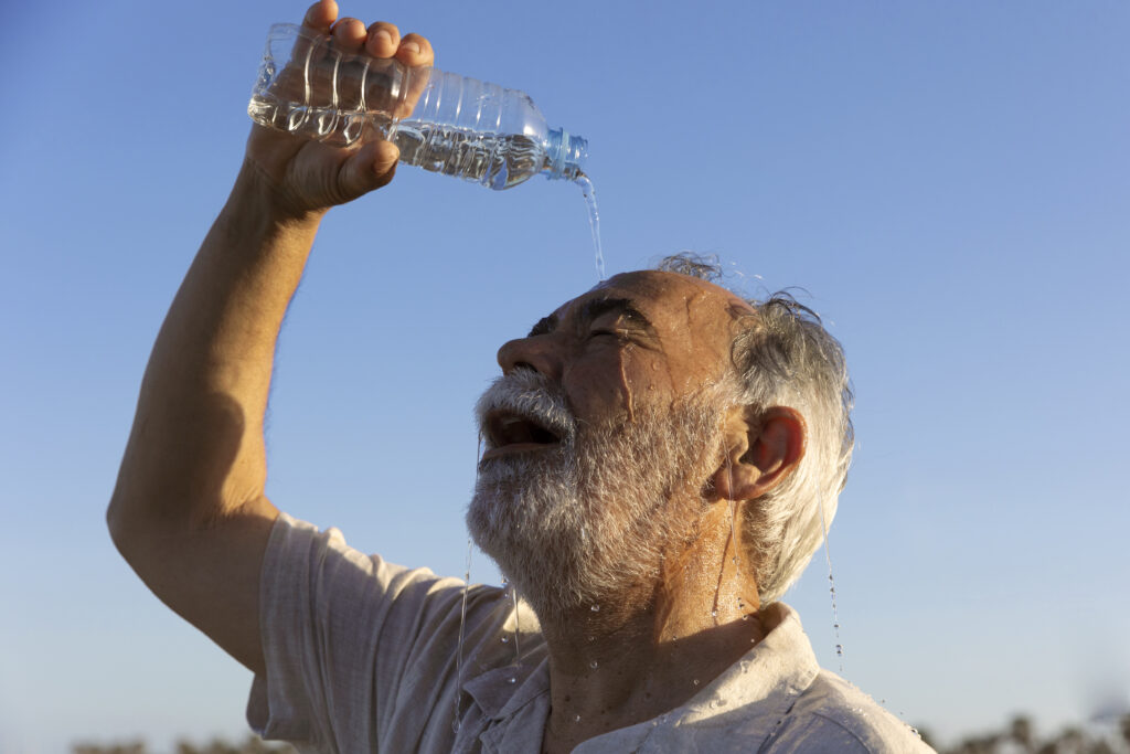 old man struggling with high temperature 1 1024x683 1